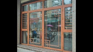 Cửa Nhôm Kính Cách Âm Vân Gỗ Cao Cấp Mới Nhất