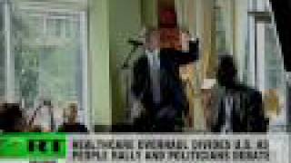 Health care in America: Ron Paul vs. Howard Dean