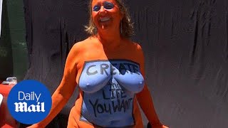 Nude models get painted in Time Square to promote positive body images - Daily Mail