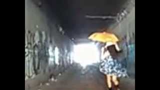 walking through in a tunnel with my silk blue rose dress.