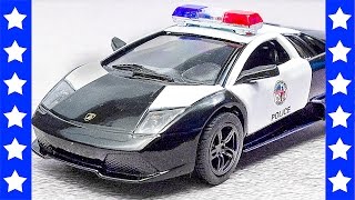 Молния Маккуин - Распаковка KINSMART Мультфильм про полицию. Мультик Тачки Полицейский Купер