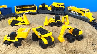 CAT Construction Toy Mighty Machines Build a Train Track - Dump Truck Bulldozer Camion de volteo
