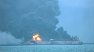 Iranian tanker ablaze and 32 crew missing after collision with freighter off China coast