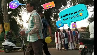 ?funny balloon popping prank with cute girl||funny public reactionll hidden prank ll