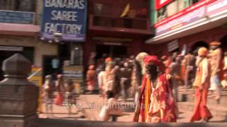 Naked Hindu holy men rallying towards Ganga Ghat in Varanasi for Maha Shivratri