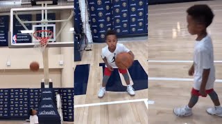 Isaiah Thomas helps his son work the on the slow grind after their Thanksgiving