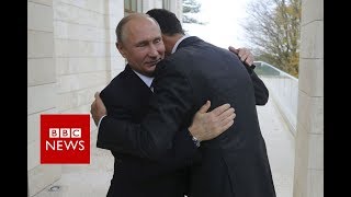 Russia's Putin visits Syria airbase and orders start of pullout - BBC News