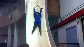 Leah on clip n climb freefall slide in dundonald ice bowl May 2013