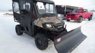 2014 Honda Pioneer 700-4 with Workman Cab, 72" Warn Blade and 4000lb Warn winch