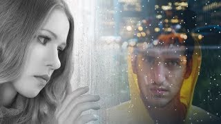 Футаж Девушка смотрит на мужчину под дождем через окно 2