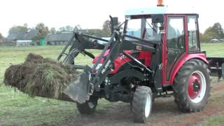 погрузка дерна минитрактором Донг-Фенг 244WD