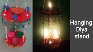 Easy beautiful wall hanging Diya/candle stand decoration/jhumar making at home |Amazing Diwali craft