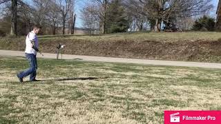 Bilateral Arm amputee Jason Koger throwing baseball with his son