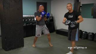 Boxing Basics: How to Use Focus Mitts to Train Punching Combinations