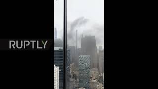 USA: Smoke billows over Manhattan after building site fire