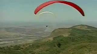 Pilot dies in crash with paraglider.