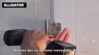 Fixer la porte de douche sur le béton cellulaire