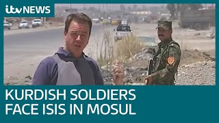 Kurdish soldiers face ISIS militants across 'No Man's Land' in Mosul, Iraq | ITV News