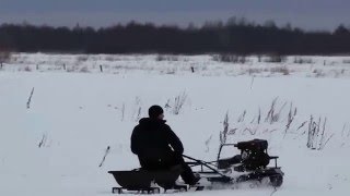 Мотобуксировщик Ahtar по сырому снегу