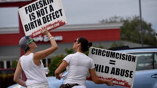 Bloodstained men say circumcision is child abuse
