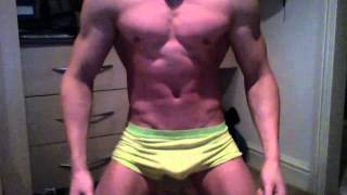 Flexbrah flexes in green underwear