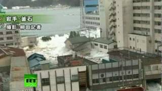 Fresh footage of huge tsunami waves smashing town in Japan