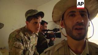 Libya forces loyal to government fight militants