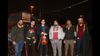 للوطن ننشد و بحبه نتغنى "عزف رائع للفنان الشاب جعفر نعمة تحت ظل المطر بعد إنتصاف الليل