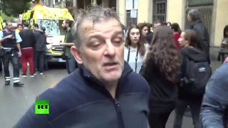 Affrontements entre la police anti-émeutes et des électeurs en marge du référendum en Catalogne