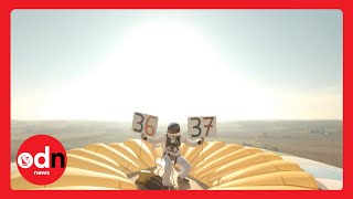 Man Breaks World RECORD for Standing on Hot Air Balloon