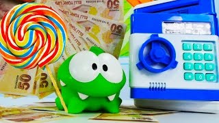 Om Nom. Toy's adventures - Kids' toys & the cash box.