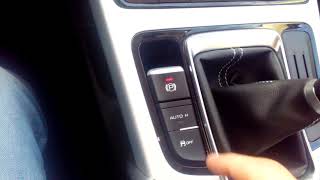 Geely Atlas разблокировка стояночного тормоза