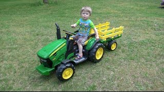 LITTLE BOY LOVES JOHN DEERE TRACTORS