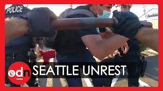 Police Bodycam Footage Shows Brutal Clashes with Protesters in Seattle