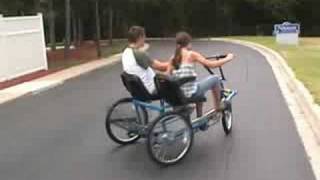 Team dual trike, is a side by side, three wheel tricycle.