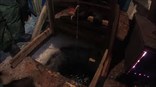 Ice fishing in Lake Baikal