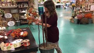 Learn how to create a front porch urn for fall
