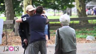 Watch what he gives people for free. FREE HUGS! This will make you smile. POK
