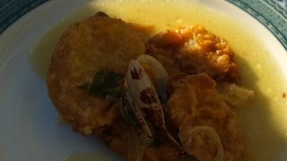 Patatas rebozadas con almejas