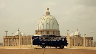 West Africa Adventure Travel: Wild Chimps, Adobe Mosques, And Basilicas