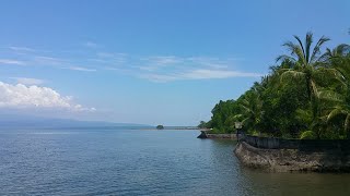 Пляж и город Guinsiliban на о. КАМИГИН. Филиппины