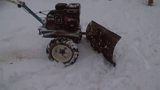 Уборка снега мотоблоком.