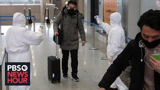 Amid coronavirus outbreak, Wuhan residents confront fear, government distrust