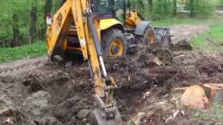 Корчевание пней экскаватором JCB 3CX в Калининграде - steh39.ru