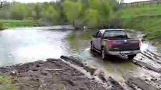 Nissan Navara D40 crossing the river ford