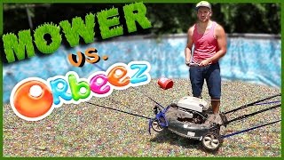MOWING A POOL FULL OF ORBEEZ! | Sam & Nia