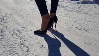 Louboutin high heels walking on very slippery snow, slide on ice (scene 4)