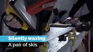 SILENTLY WAXING SKIS