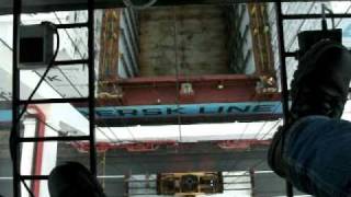 Container crane loading ship