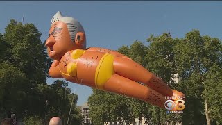 Protesters Fly Balloon Of Mayor Dressed In Bikini Over Parliament Square